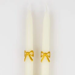 Meri-Meri Gold Bow Taper Candles (x 2) 9 Meri-Meri Gold Bow Taper Candles (x 2) -Party Supply Discount Store media 055a8fc0 098d 4e38 b932 ae23868dab58