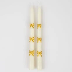 Meri-Meri Gold Bow Taper Candles (x 2) 8 Meri-Meri Gold Bow Taper Candles (x 2) -Party Supply Discount Store media 3a3b4c88 ad40 4510 bee3 52f27cf5a06c