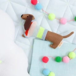 Meri-Meri Sausage Dog Baby Rattle -Party Supply Discount Store media b372f166 d4f9 4f4e b777 95ee34d8500f